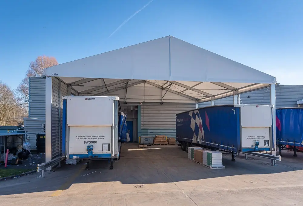 Warehouse loading canopies – the easiest way to protect stock? - HTS TENTIQ